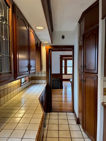 a bathroom with a glass door shower