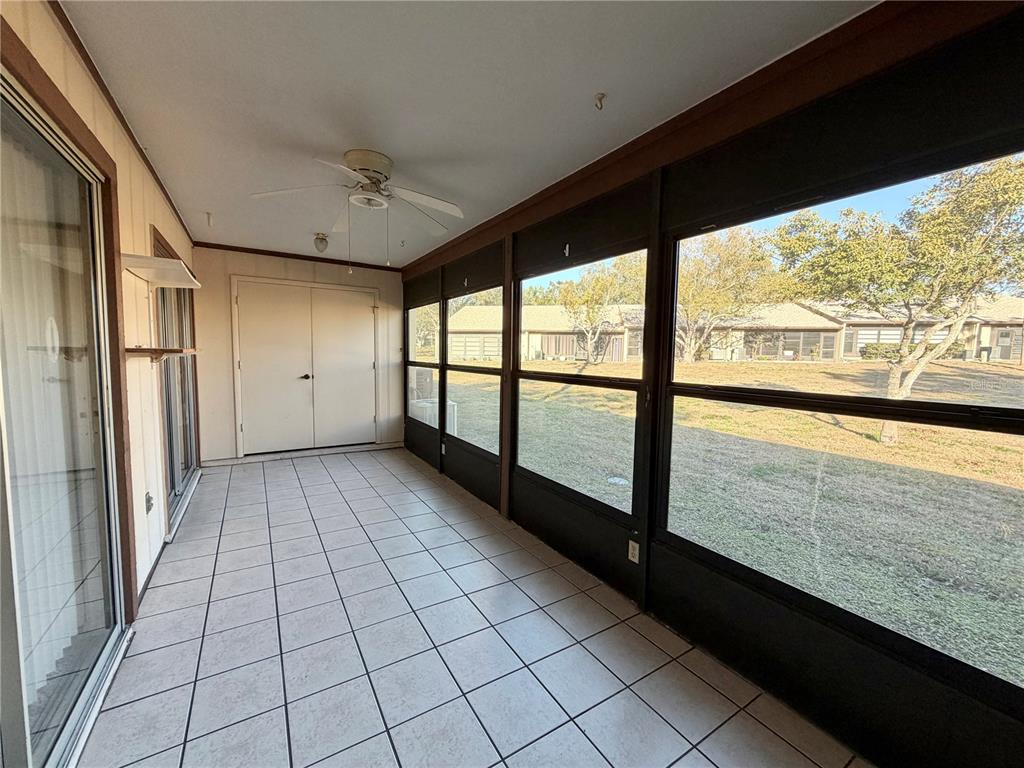 11210 Dollar Lake Drive, Unit 2 Port Richey, FL 34668 - Photo 14 of 15 a view of an empty room and window