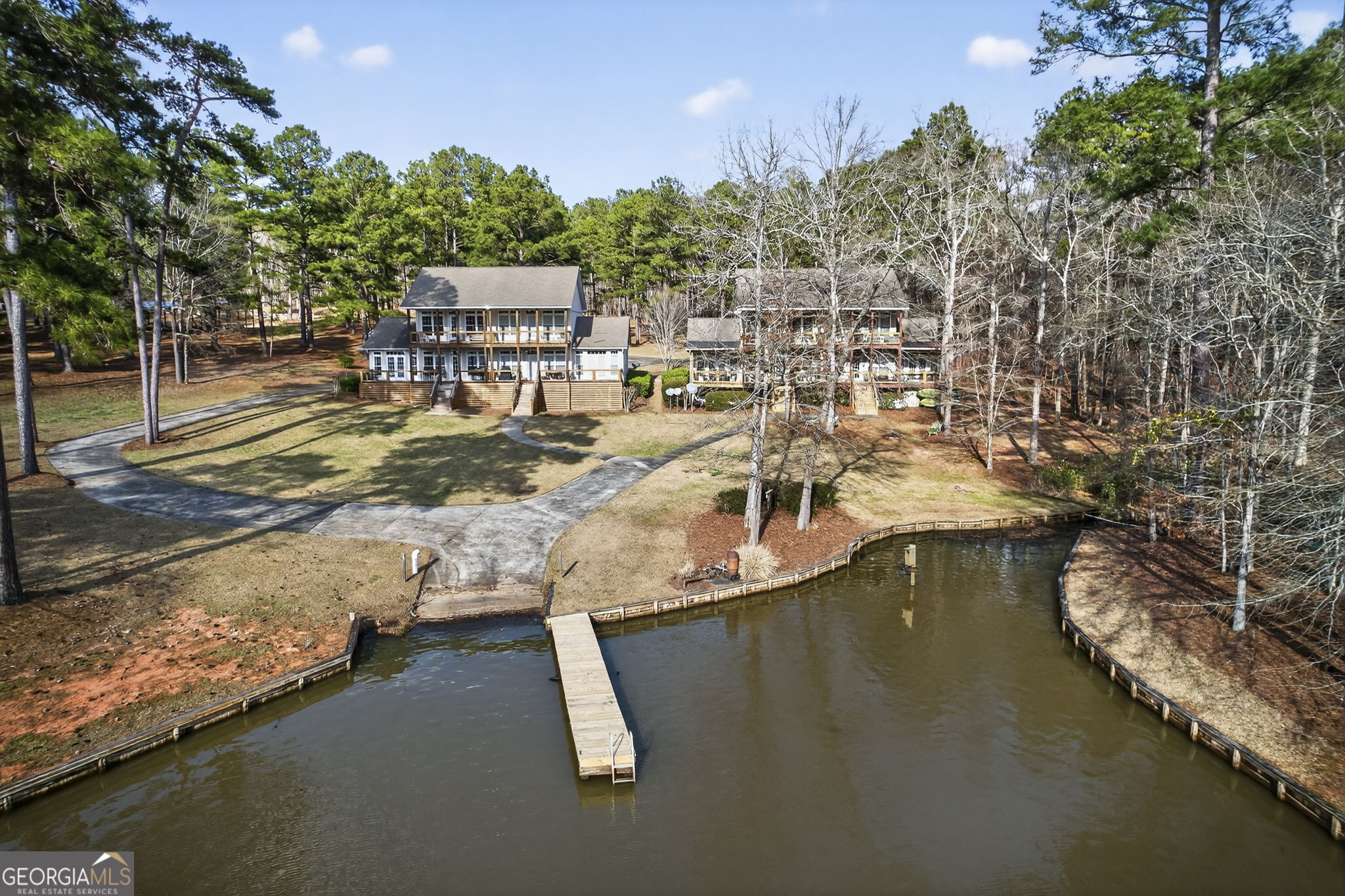 655 Sandy Run Drive, Unit 4 Sparta, GA 31087 - Photo 15 of 59 a view of a lake with houses