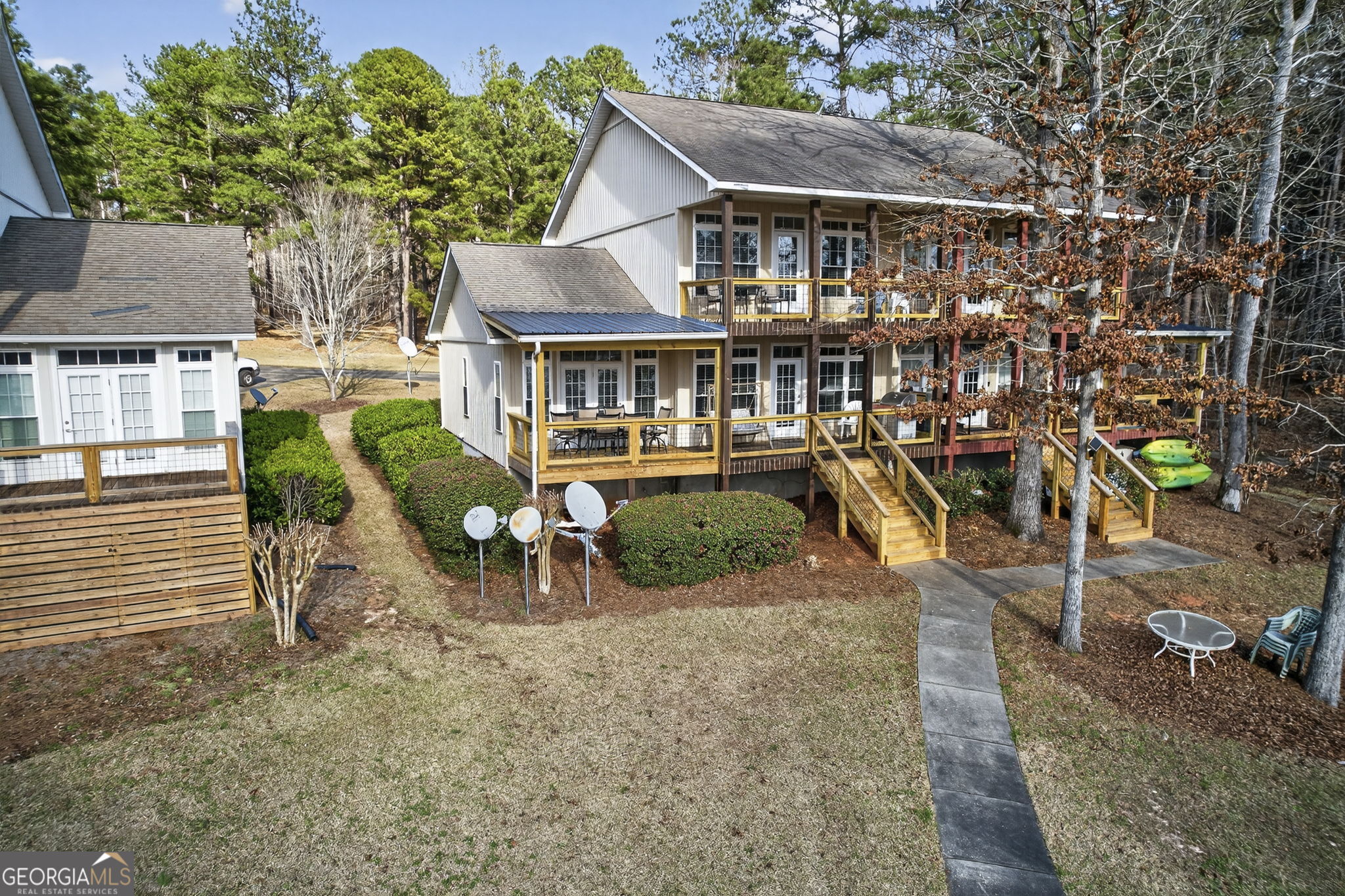 655 Sandy Run Drive, Unit 4 Sparta, GA 31087 - Photo 16 of 59 an aerial view of a house with a yard and lake view