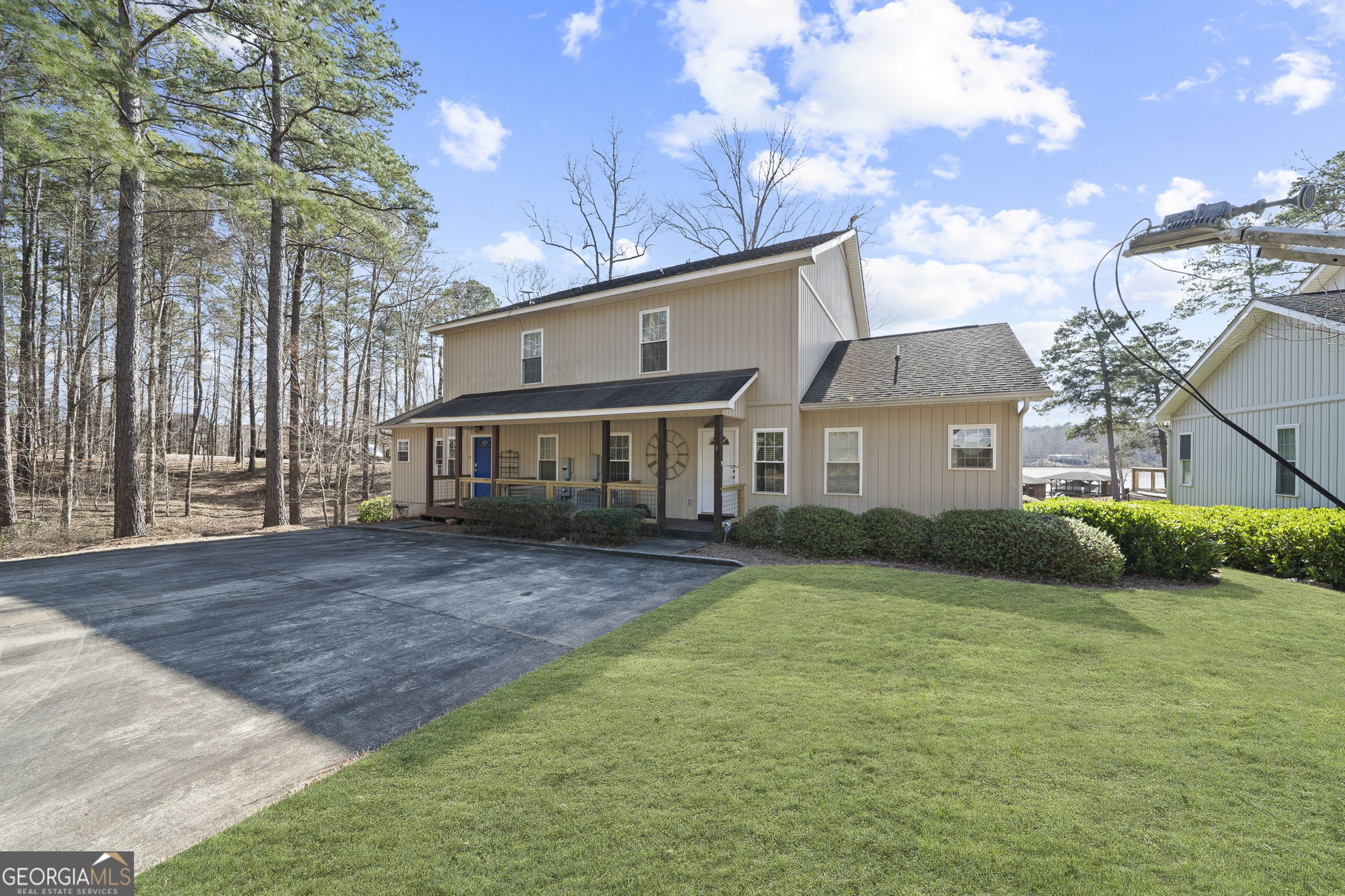 655 Sandy Run Drive, Unit 4 Sparta, GA 31087 - Photo 21 of 59 a front view of a house with garden