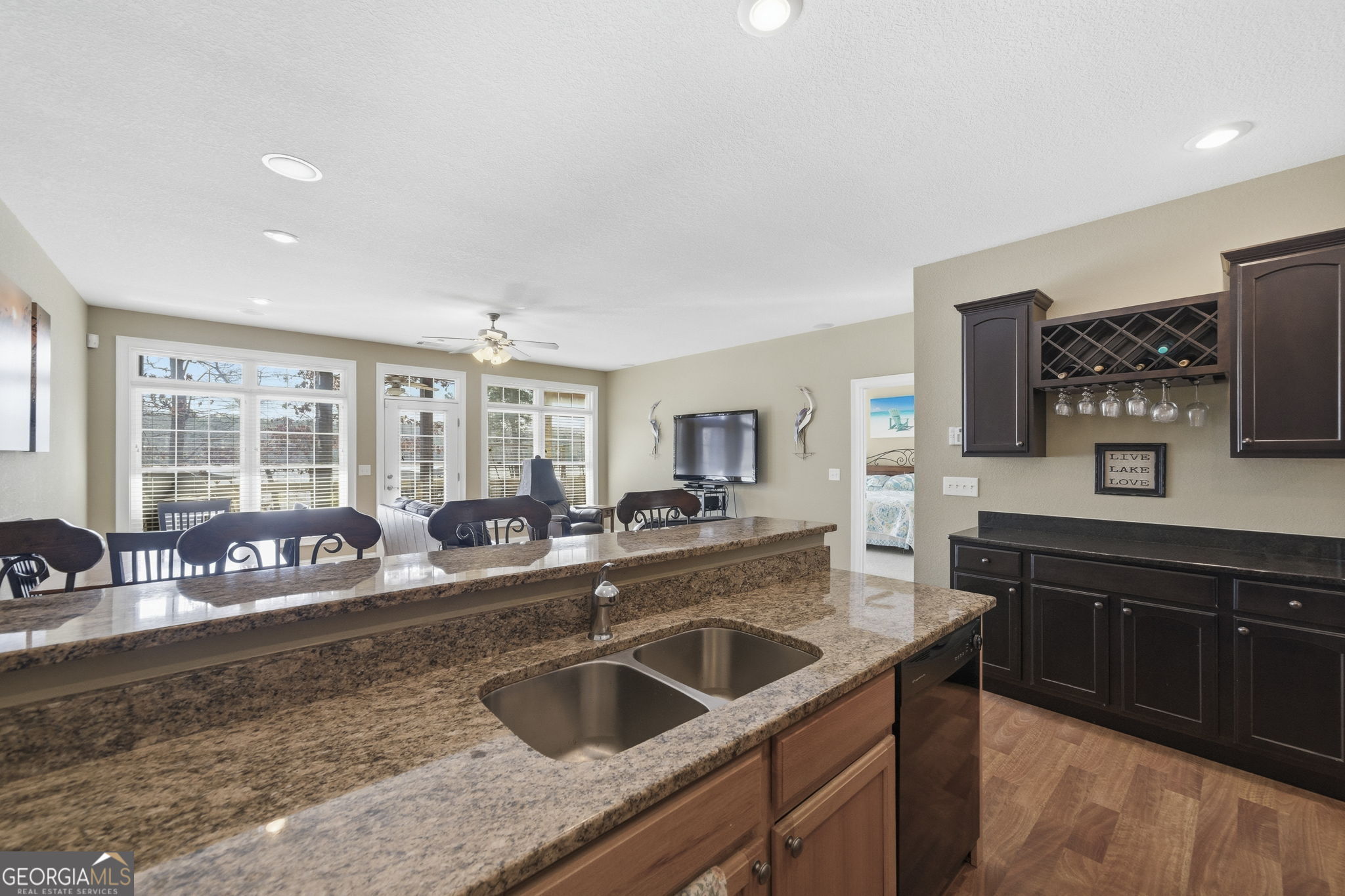 655 Sandy Run Drive, Unit 4 Sparta, GA 31087 - Photo 31 of 59 a kitchen with stainless steel appliances granite countertop a sink and a stove