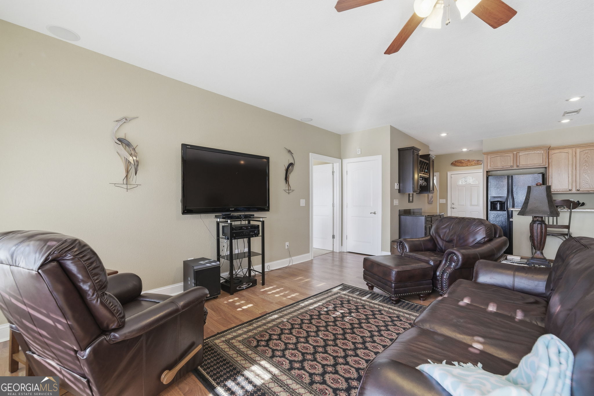 655 Sandy Run Drive, Unit 4 Sparta, GA 31087 - Photo 34 of 59 a living room with furniture and a flat screen tv