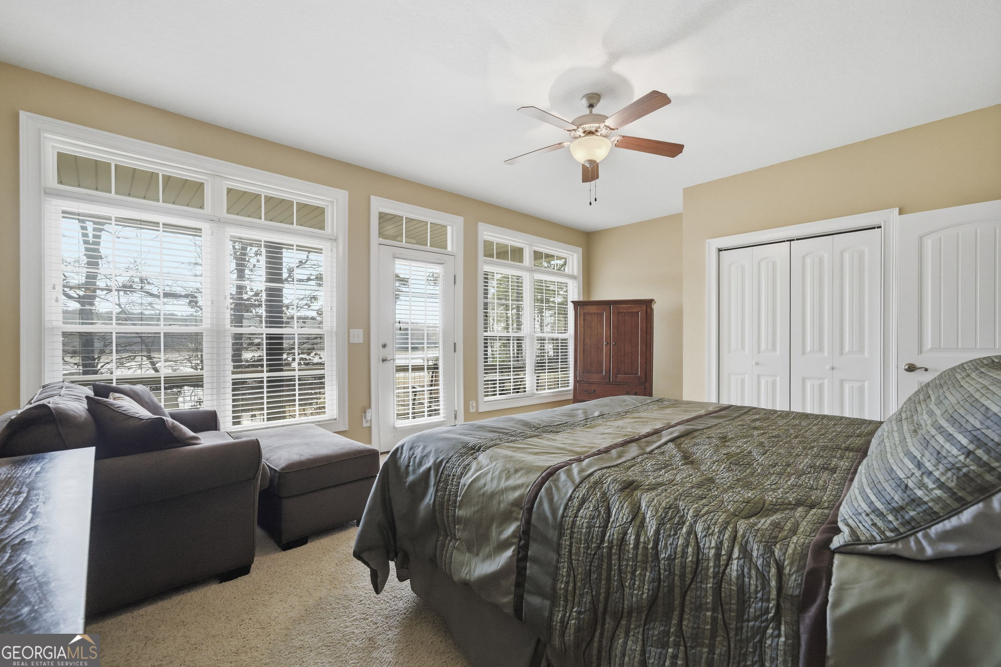 655 Sandy Run Drive, Unit 4 Sparta, GA 31087 - Photo 45 of 59 a bedroom with a bed and a large window