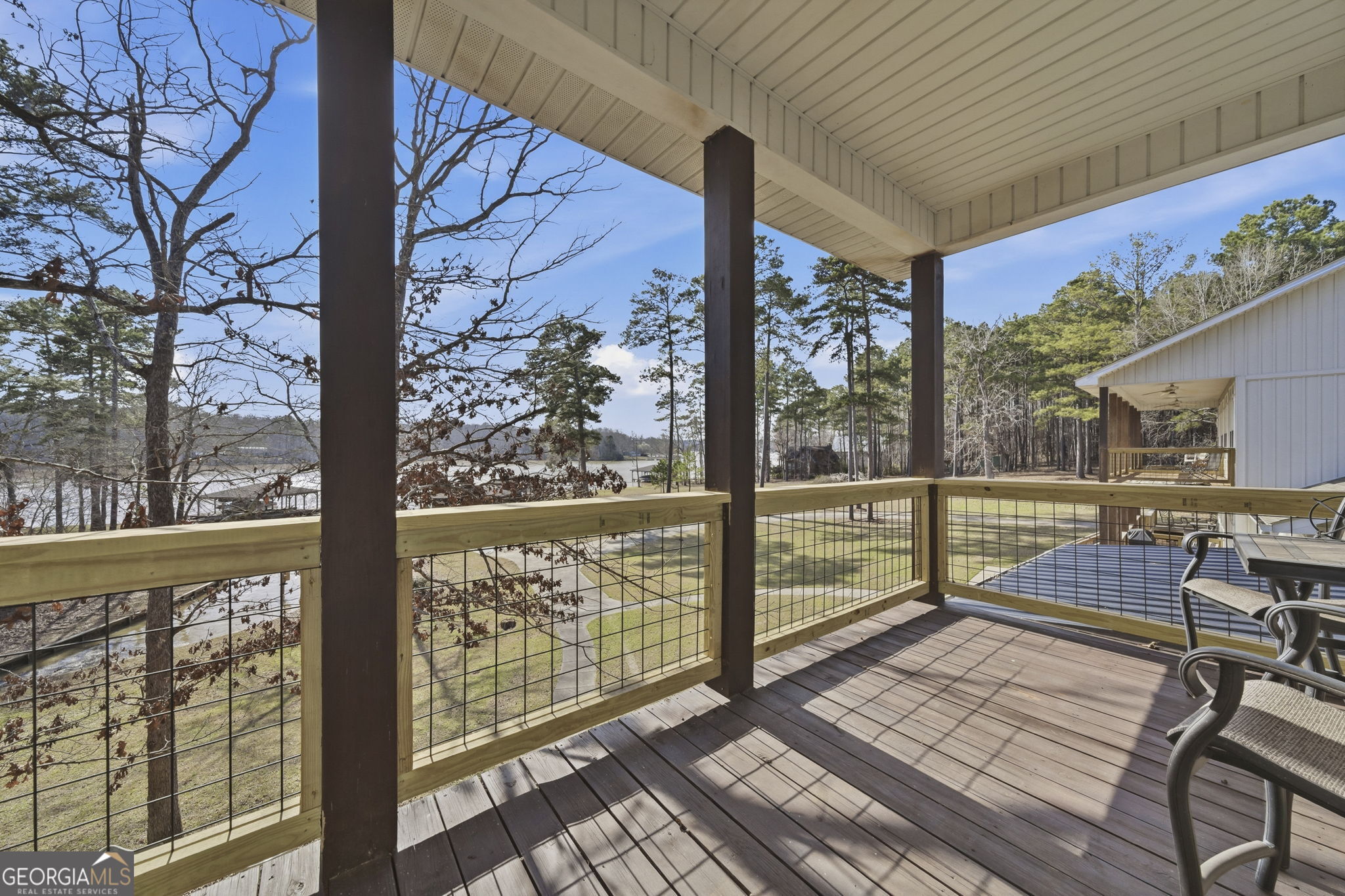 655 Sandy Run Drive, Unit 4 Sparta, GA 31087 - Photo 50 of 59 a view of a porch with wooden floor and outdoor space
