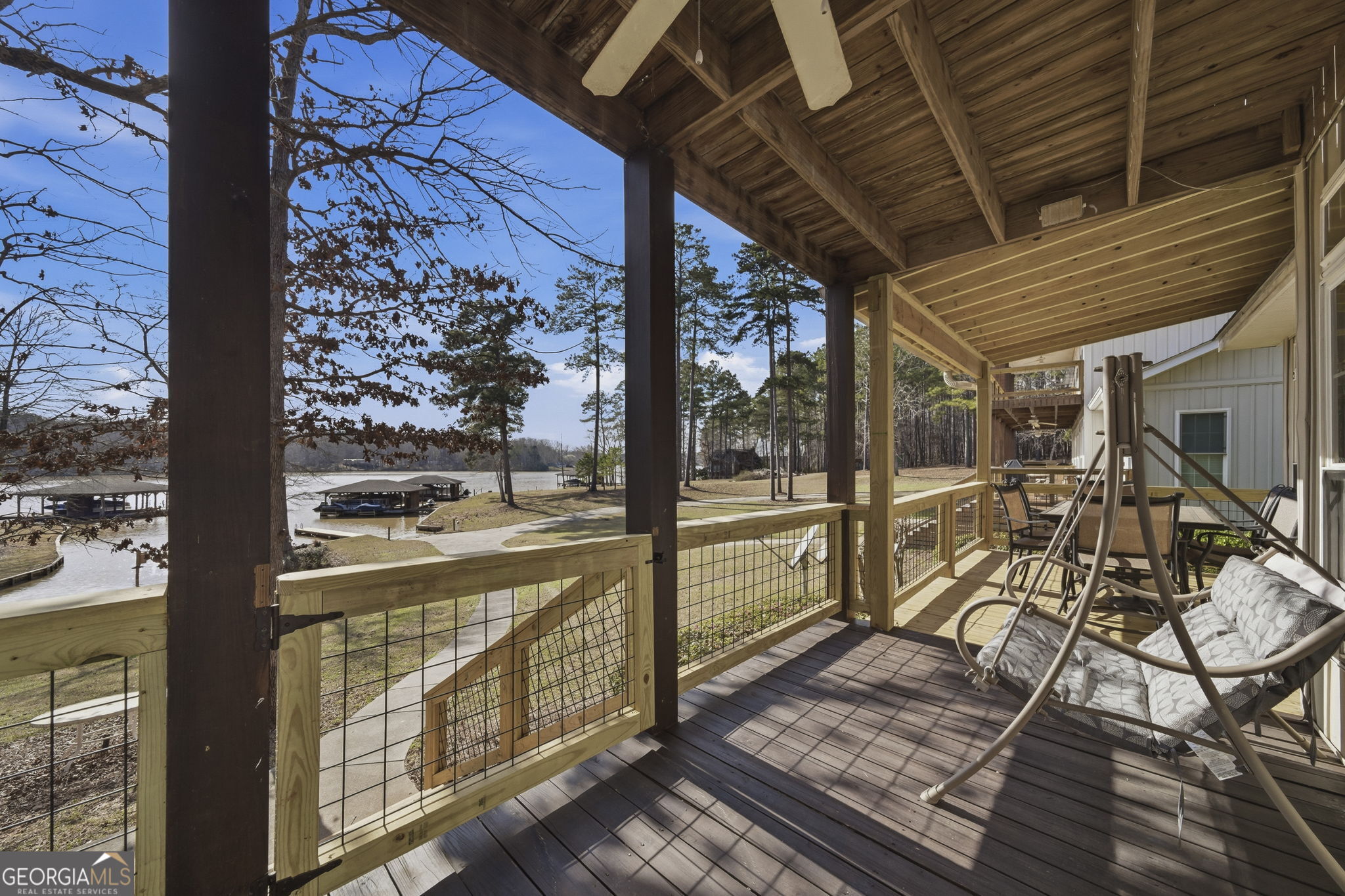655 Sandy Run Drive, Unit 4 Sparta, GA 31087 - Photo 52 of 59 a view of a porch with wooden floor