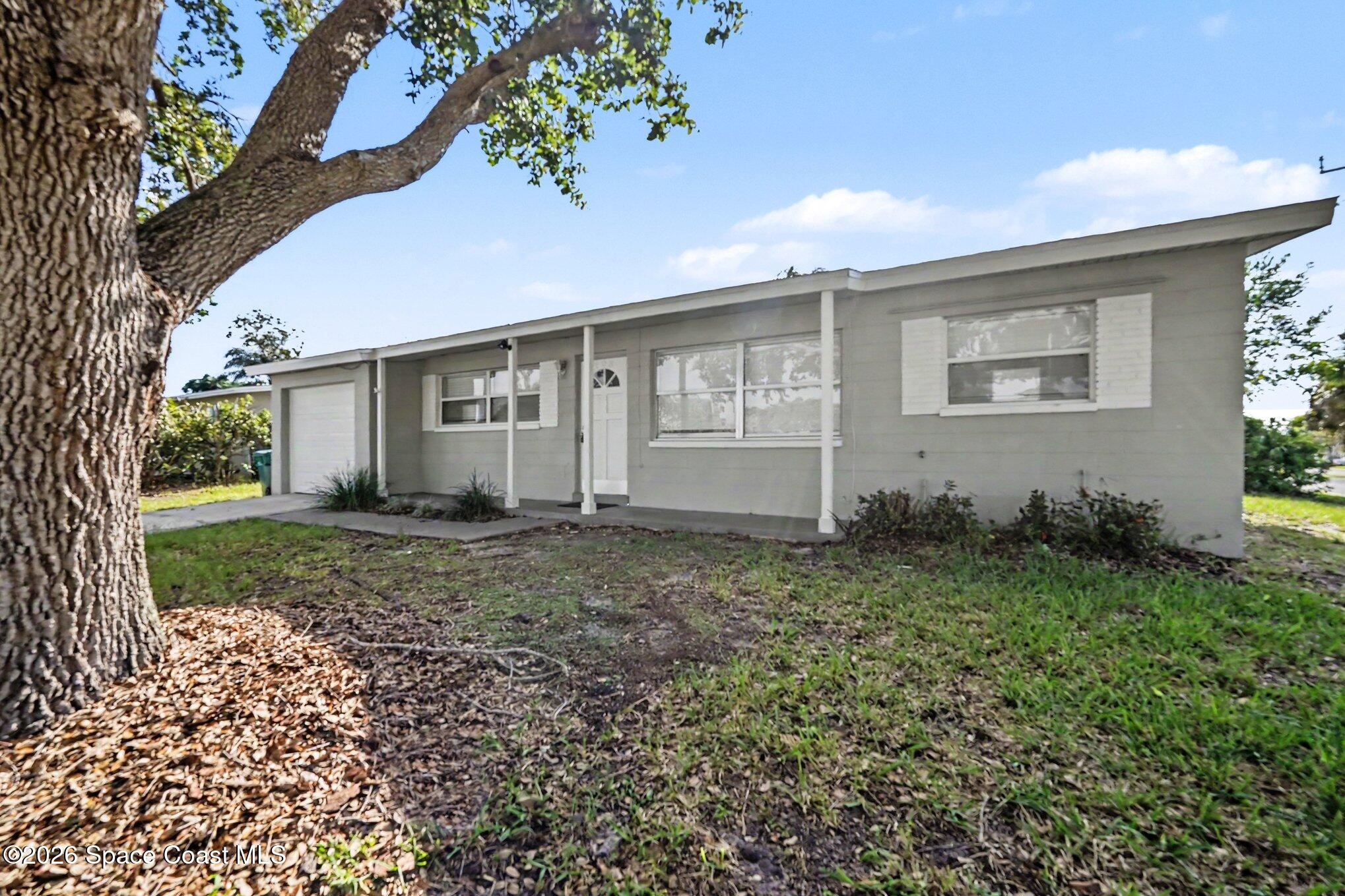 705 Renner Avenue Melbourne, FL 32935 - Photo 1 of 18 front