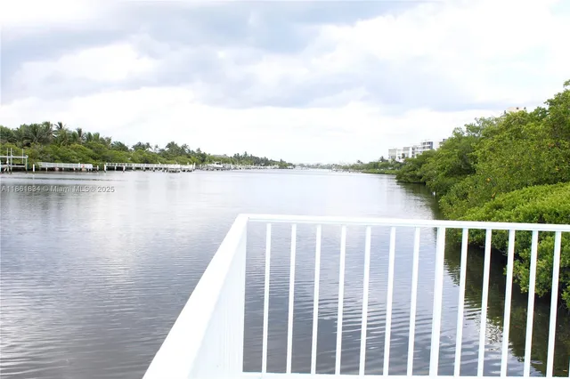 a view of a lake with a large trees