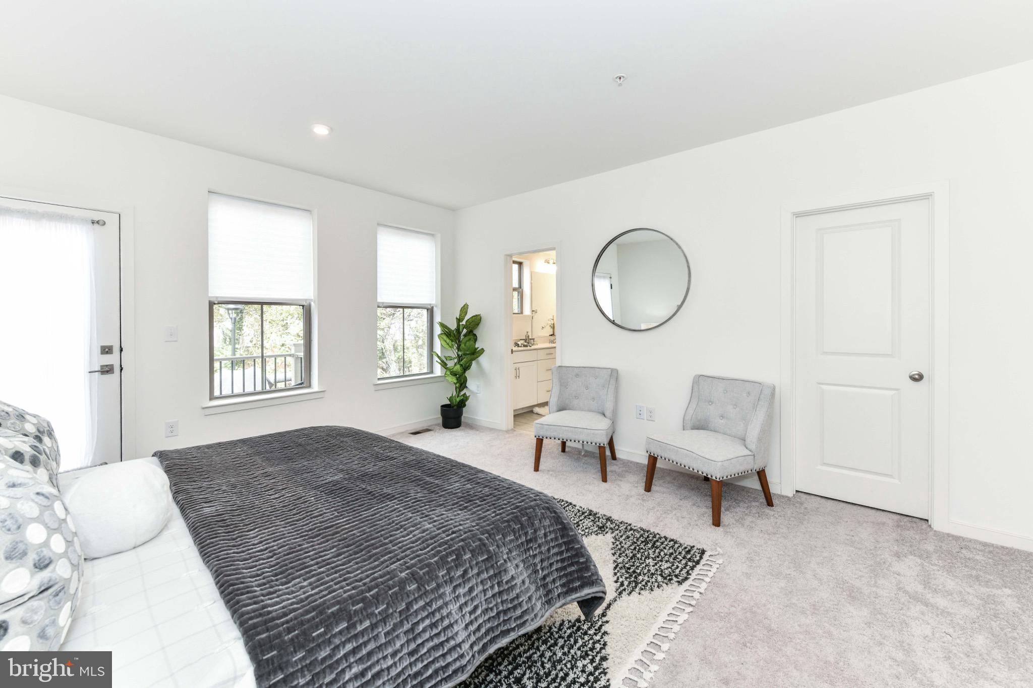 45922 Swallow Terrace Sterling, VA 20165 - Photo 20 of 36 a bedroom with a bed and window