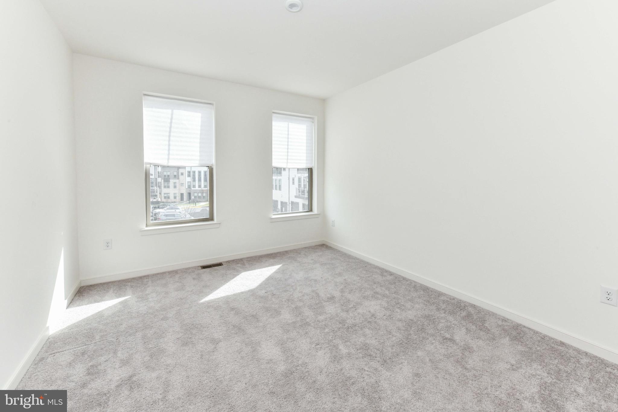 45922 Swallow Terrace Sterling, VA 20165 - Photo 29 of 36 an empty room with windows