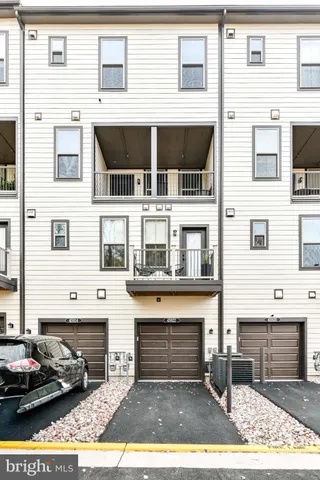 a view of a brick building with many windows