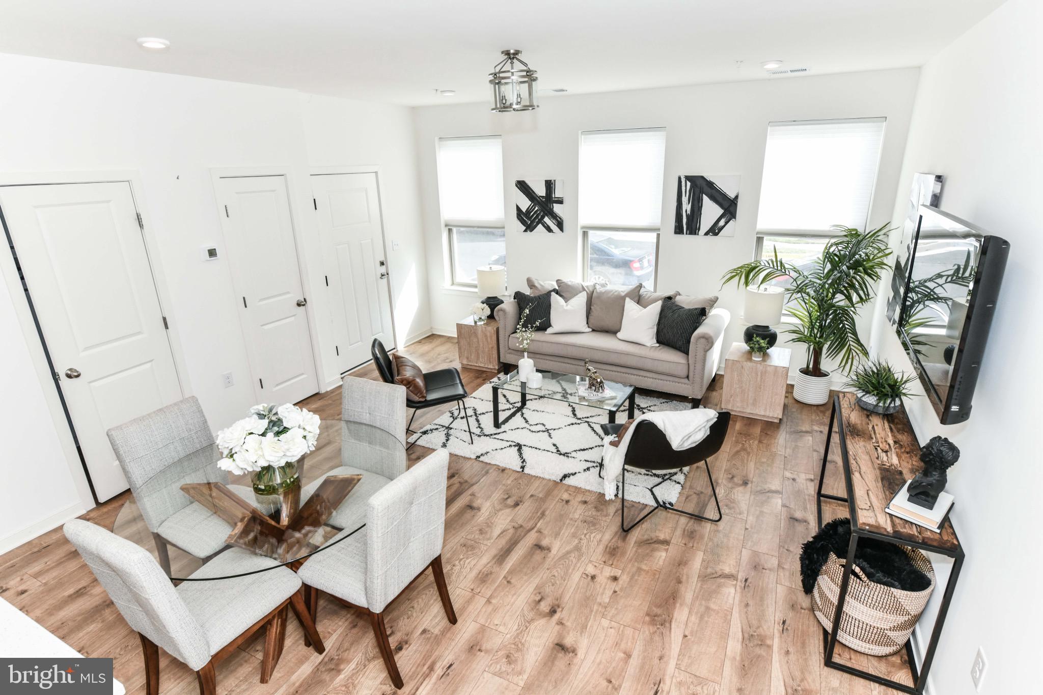 45922 Swallow Terrace Sterling, VA 20165 - Photo 6 of 36 a living room with furniture and a wooden floor