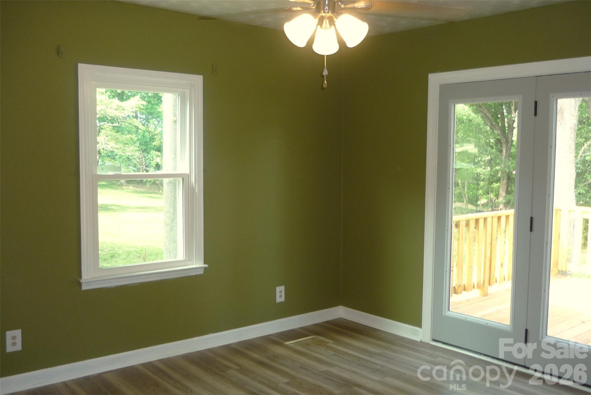 120 Bradley Road Shelby, NC 28152 - Photo 21 of 42 a view of an empty room with wooden floor and a window