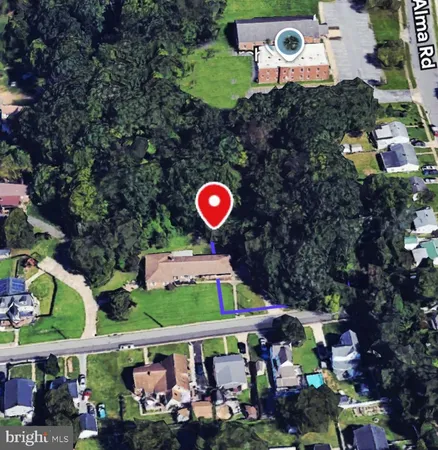 an outdoor space view with swimming pool and outdoor seating