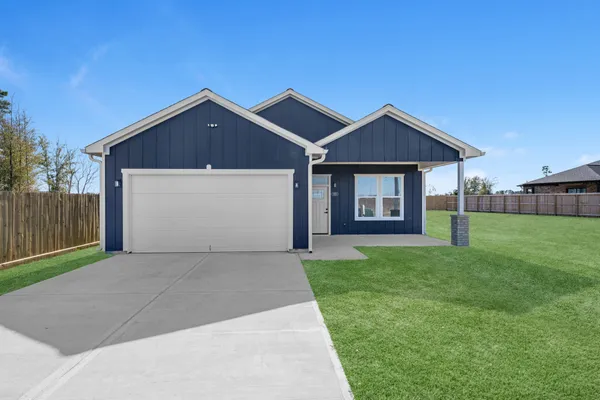 a front view of a house with yard