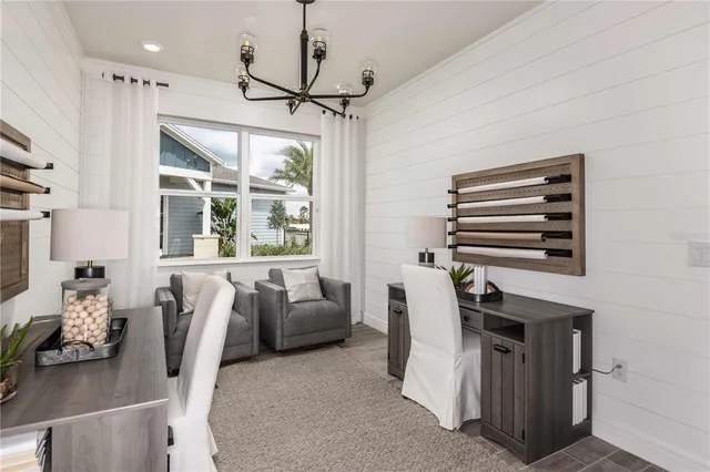 a view of a livingroom with furniture and windows
