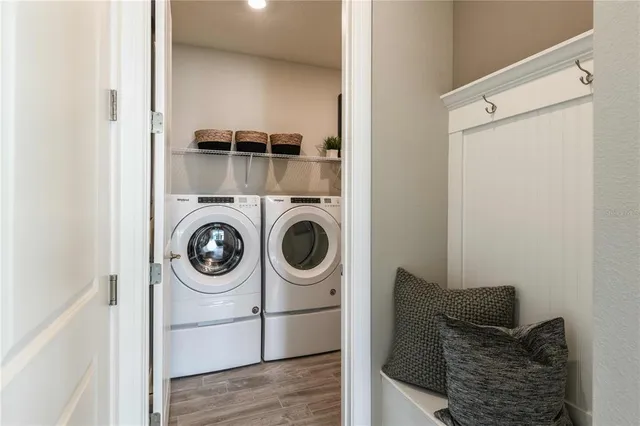 a utility room with dryer and washer