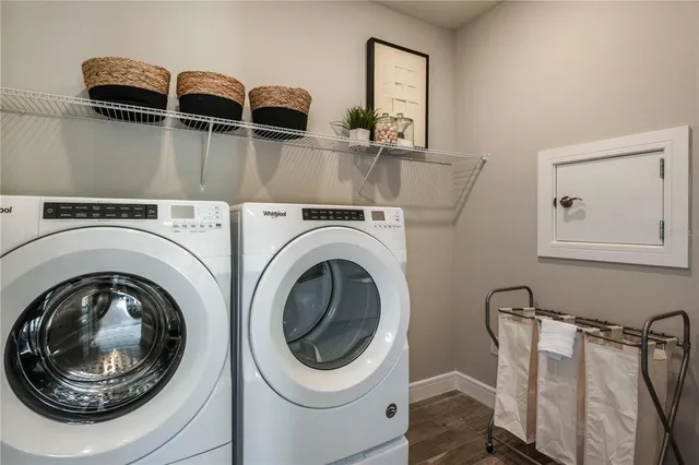 a utility room with dryer and washer