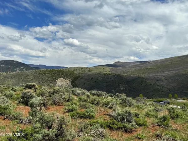 a view of a lake with a mountain