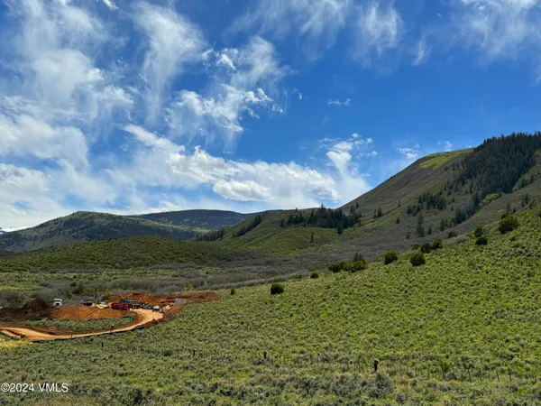 a view of a lake with a mountain in the background