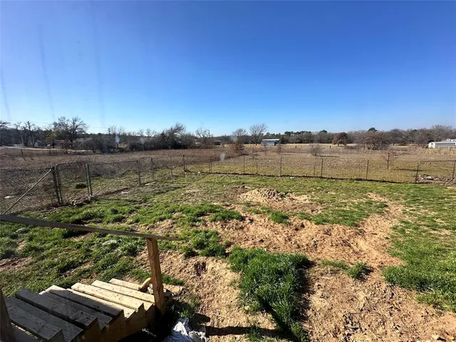 a view of a balcony with an outdoor space