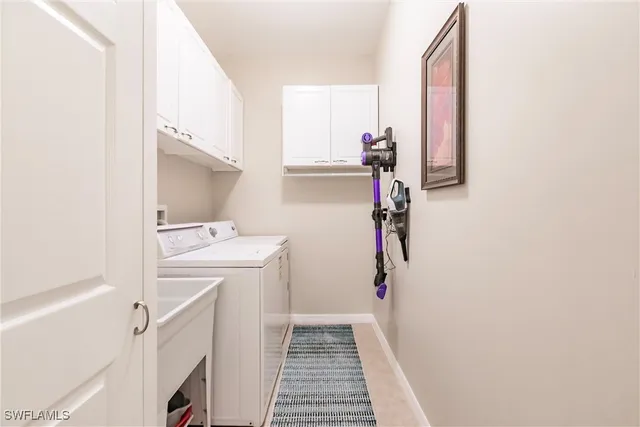 a storage room with a washer and dryer