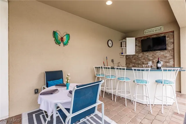 a view of a workspace with furniture