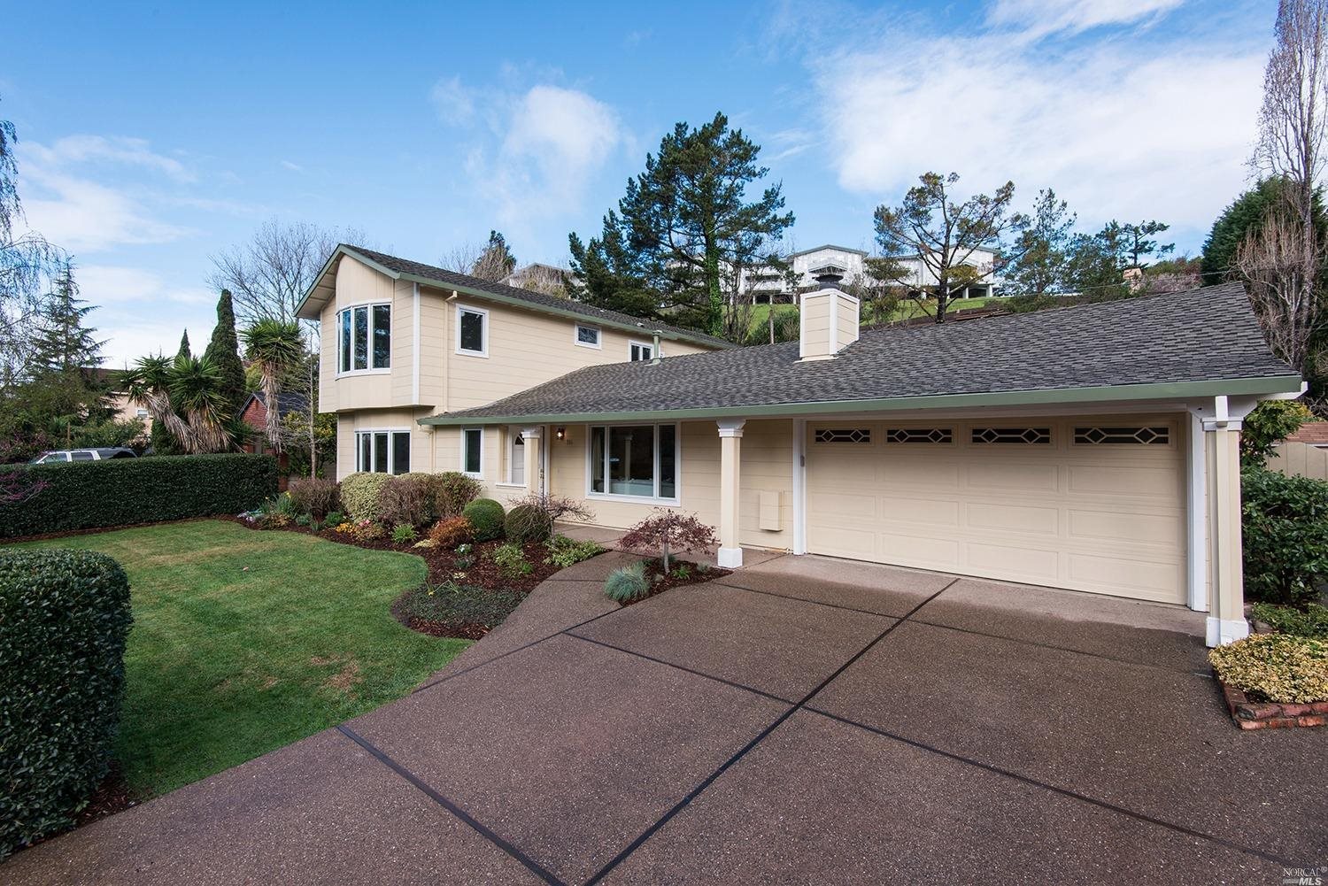 316 Ricardo Road Mill Valley, CA 94941 - Photo 1 of 1 a front view of a house with a garden and plants