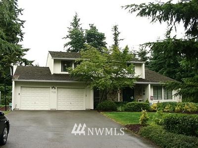 713 175th Street Southwest Bothell, WA 98012 - Photo 1 of 1 front view of a house with a yard