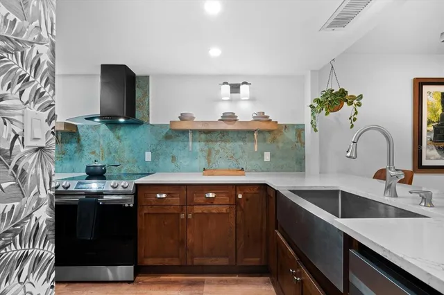 a kitchen with a sink and cabinets