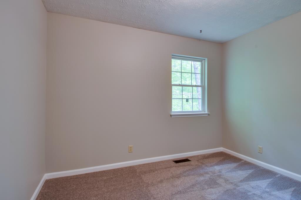 121 Brookside Point Springfield, TN 37172 - Photo 11 of 19 an empty room with a window