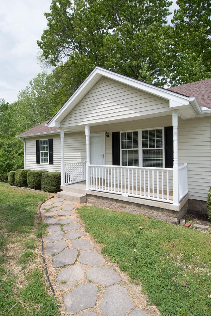 121 Brookside Point Springfield, TN 37172 - Photo 17 of 19 a backyard of a house with a small yard