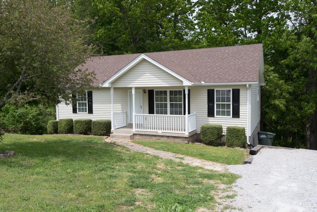 121 Brookside Point Springfield, TN 37172 - Photo 19 of 19 a front view of a house with a yard