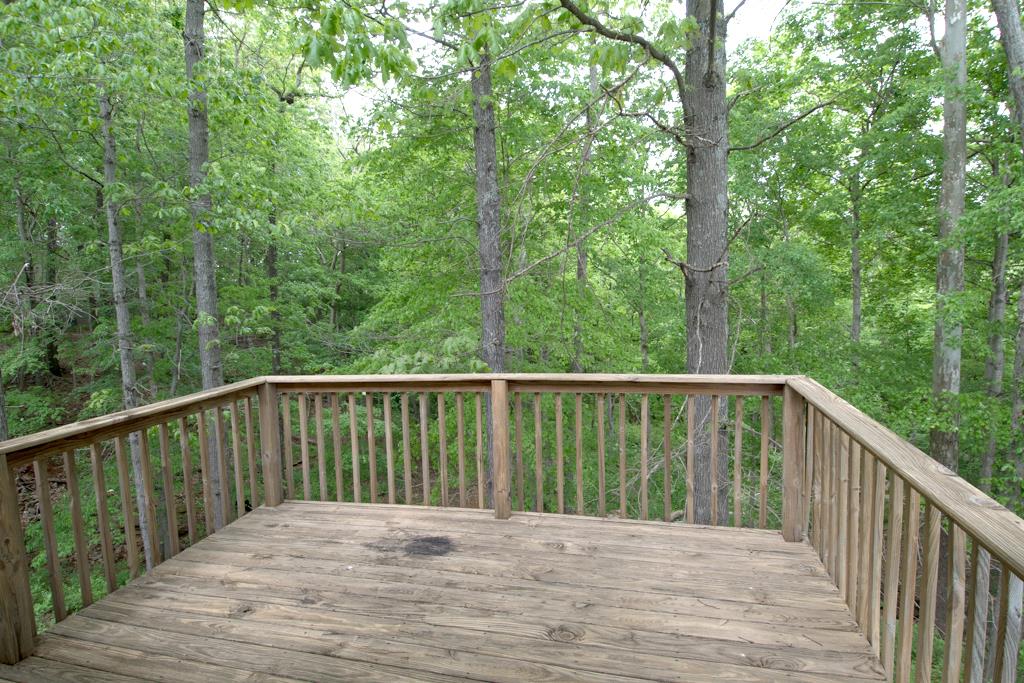 121 Brookside Point Springfield, TN 37172 - Photo 3 of 19 a balcony view with wooden floor and fence