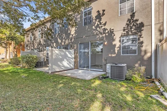 a backyard of a house with lots of green space