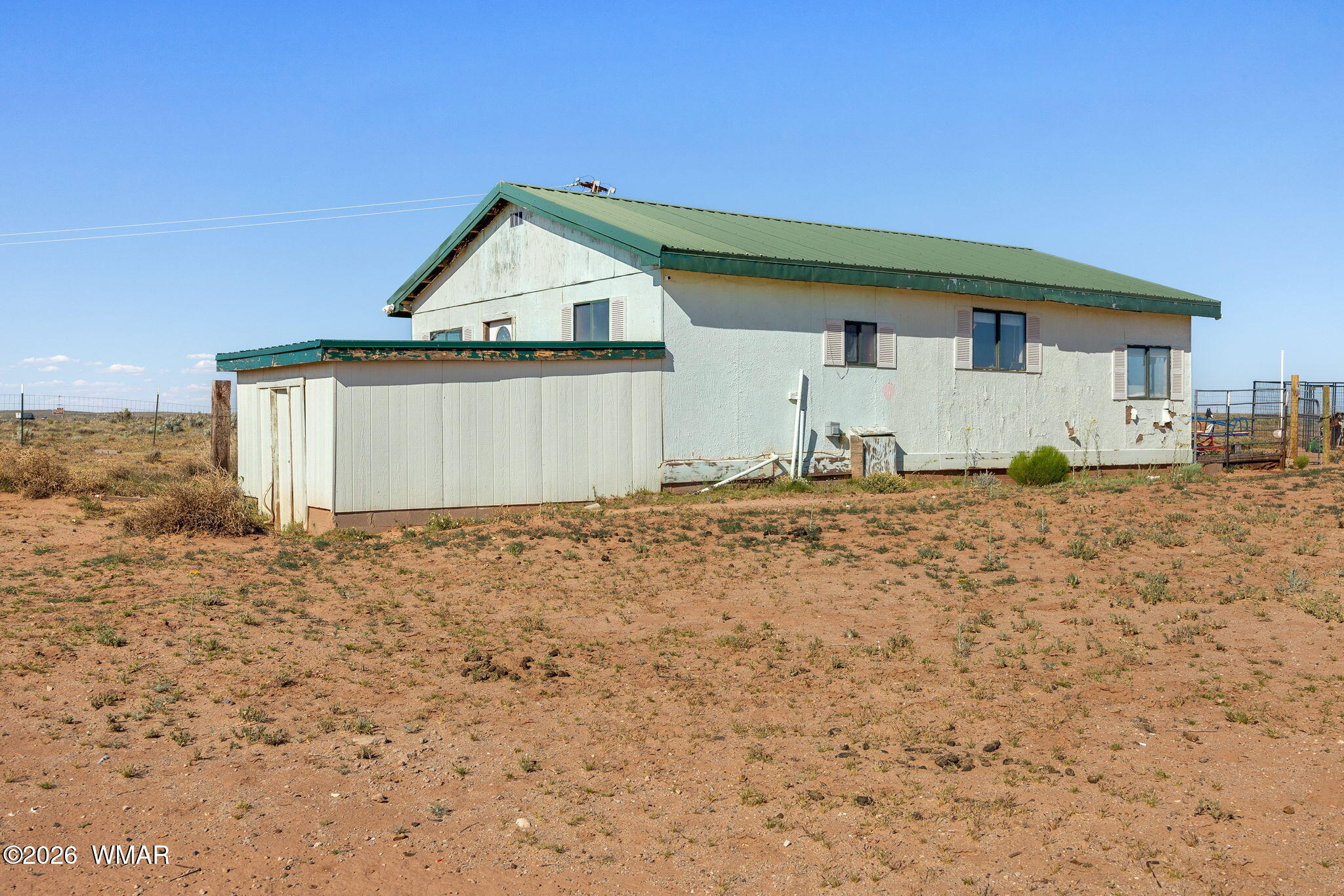 80 L K Ranch Road Holbrook, AZ 86025 - Photo 14 of 29 a view of backyard of house