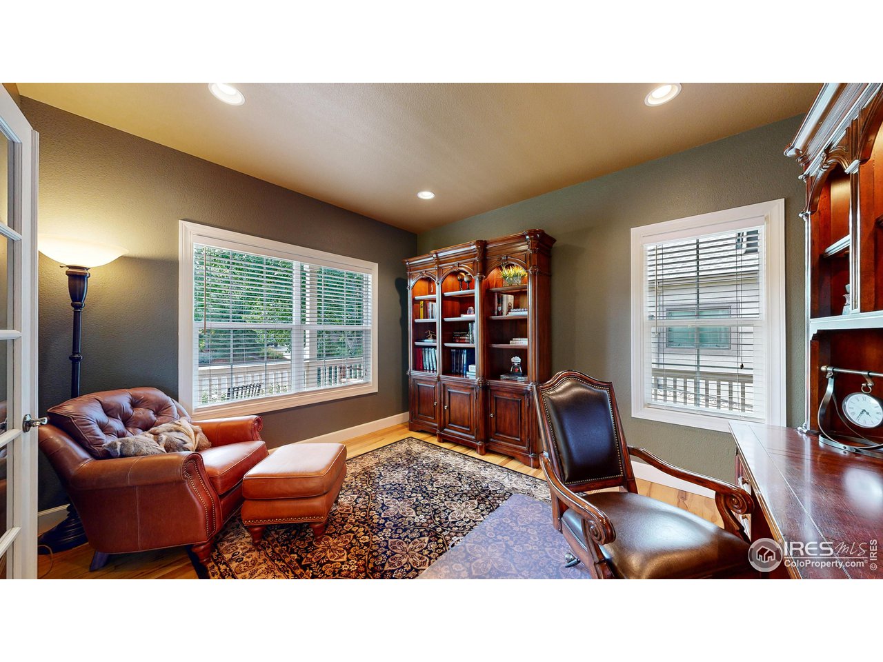 8398 Spinnaker Bay Drive Windsor, CO 80528 - Photo 15 of 40 a living room with furniture and a window