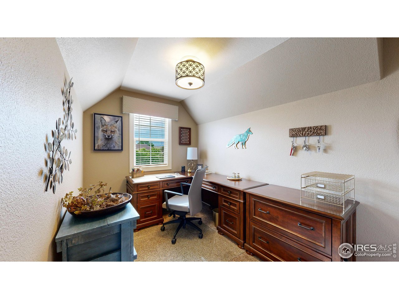8398 Spinnaker Bay Drive Windsor, CO 80528 - Photo 23 of 40 a living room with furniture and a window