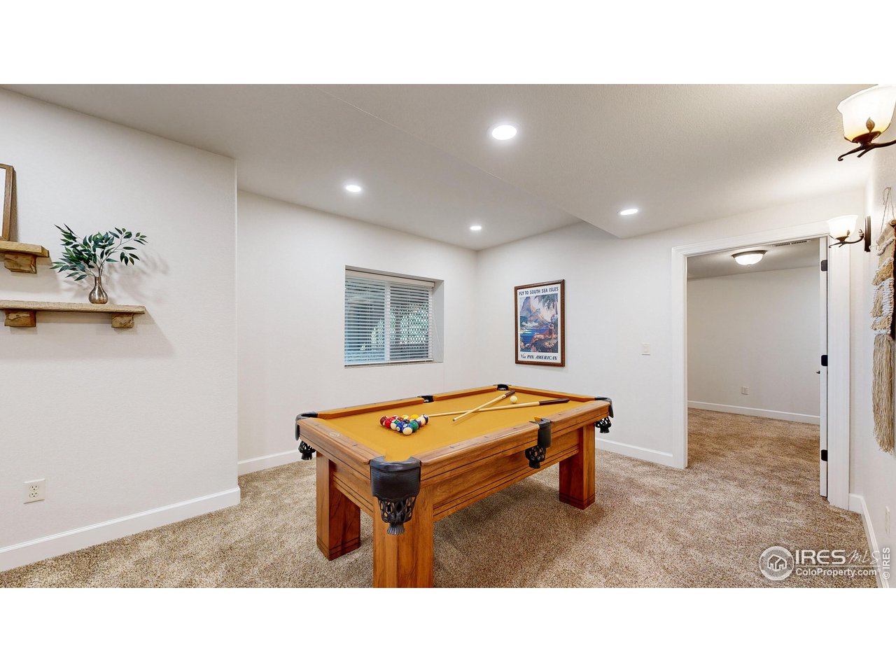 8398 Spinnaker Bay Drive Windsor, CO 80528 - Photo 26 of 40 a room with furniture and window
