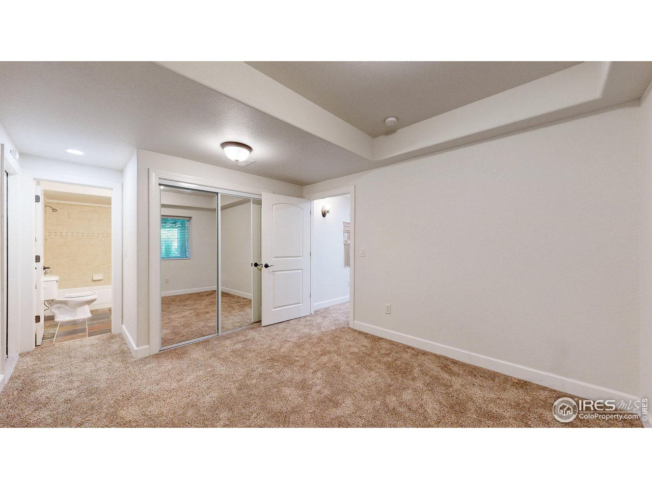 8398 Spinnaker Bay Drive Windsor, CO 80528 - Photo 29 of 40 a open hall with wooden floor