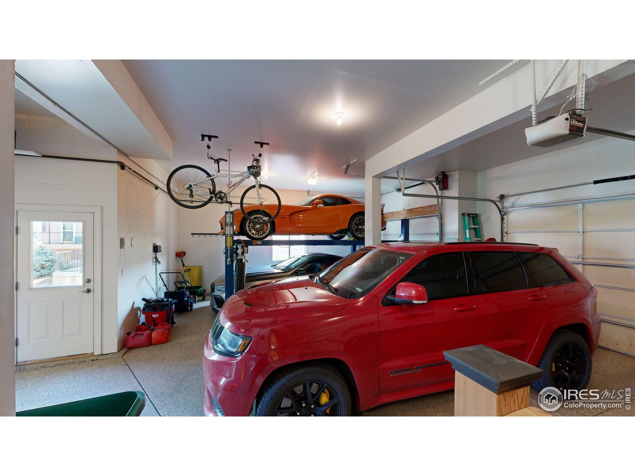 8398 Spinnaker Bay Drive Windsor, CO 80528 - Photo 34 of 40 a cars parked in front of a building