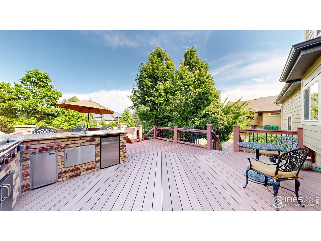 8398 Spinnaker Bay Drive Windsor, CO 80528 - Photo 8 of 40 a terrace with outdoor seating