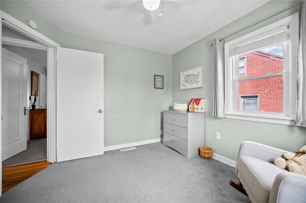 416 Phillips Avenue McKees Rocks, PA 15136 - Photo 24 of 46 a living room with furniture and a window