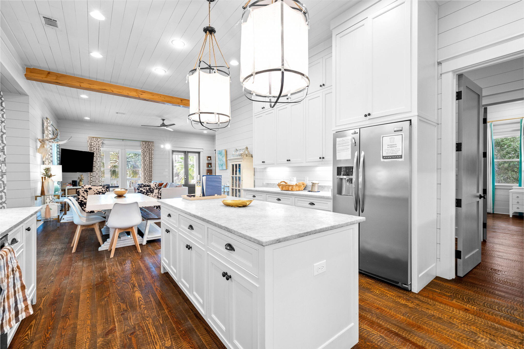 213 Bramble Street Santa Rosa Beach, FL 32459 - Photo 27 of 62 a large kitchen with stainless steel appliances a lot of counter space and wooden floor