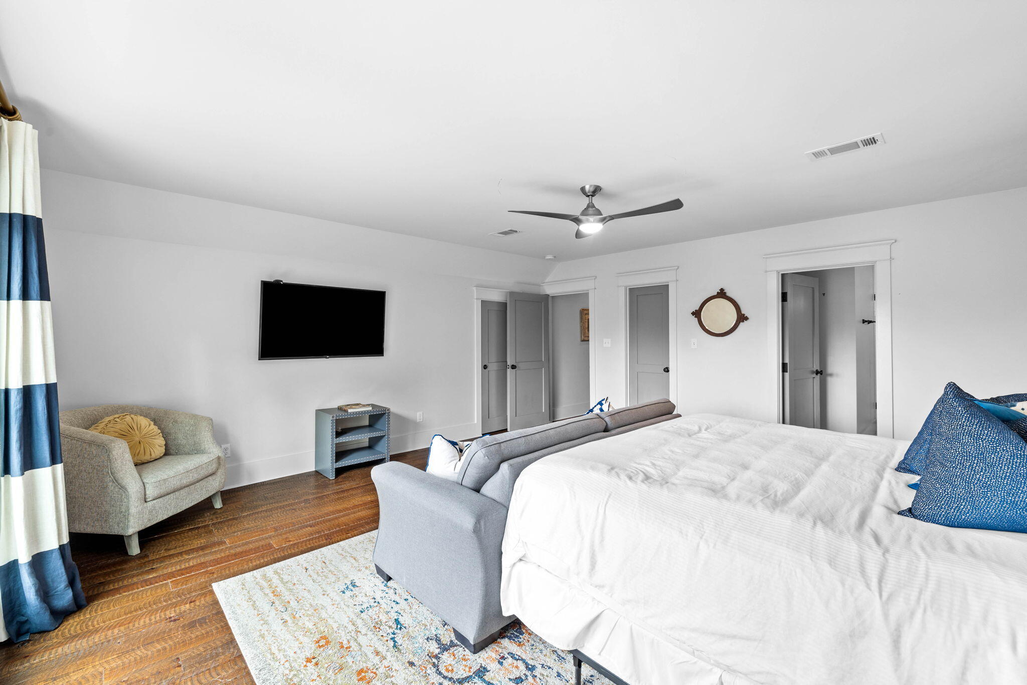 213 Bramble Street Santa Rosa Beach, FL 32459 - Photo 36 of 62 a spacious bedroom with a bed and a couch