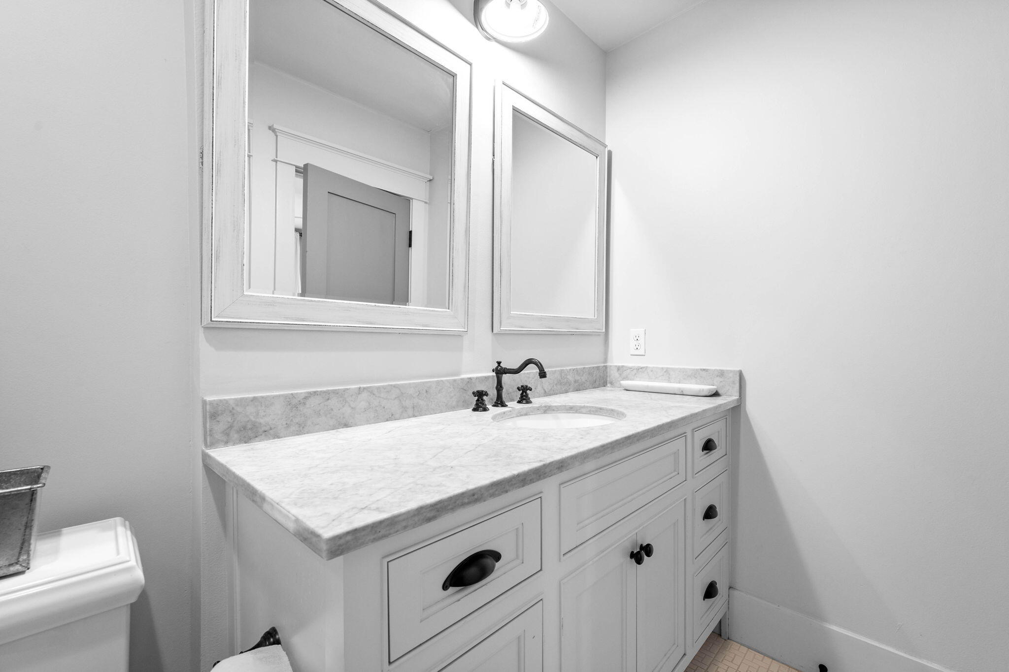 213 Bramble Street Santa Rosa Beach, FL 32459 - Photo 41 of 62 a bathroom with a sink and a toilet