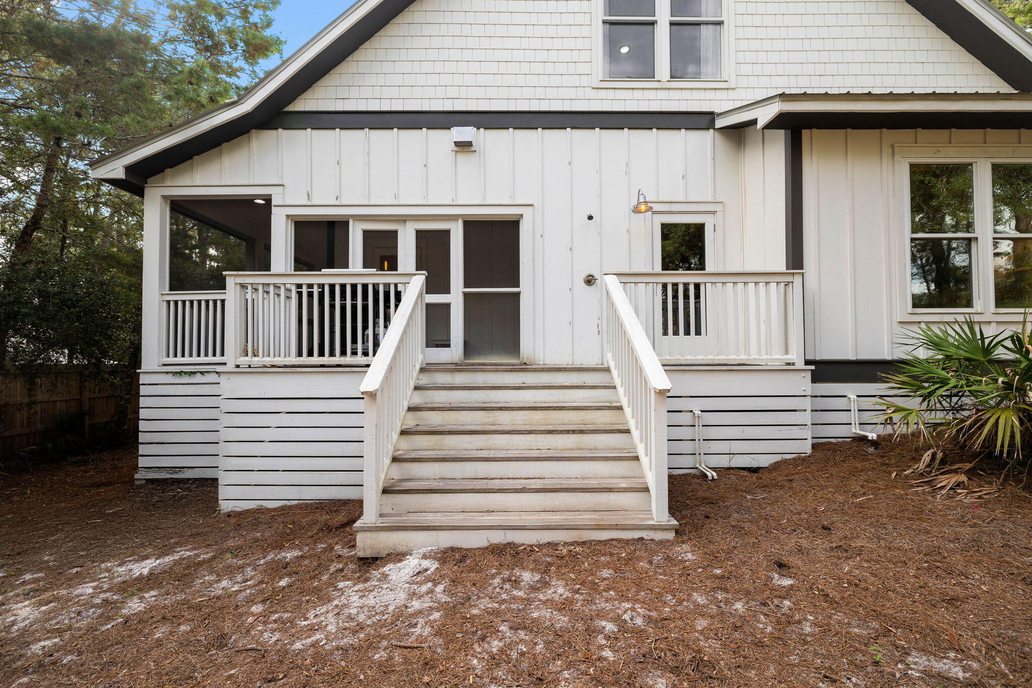 213 Bramble Street Santa Rosa Beach, FL 32459 - Photo 47 of 62 a view of a house with more and wooden stairs