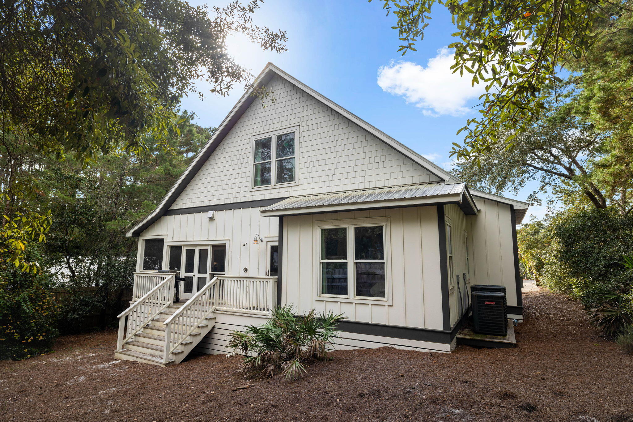 213 Bramble Street Santa Rosa Beach, FL 32459 - Photo 49 of 62 a view of a house with a yard