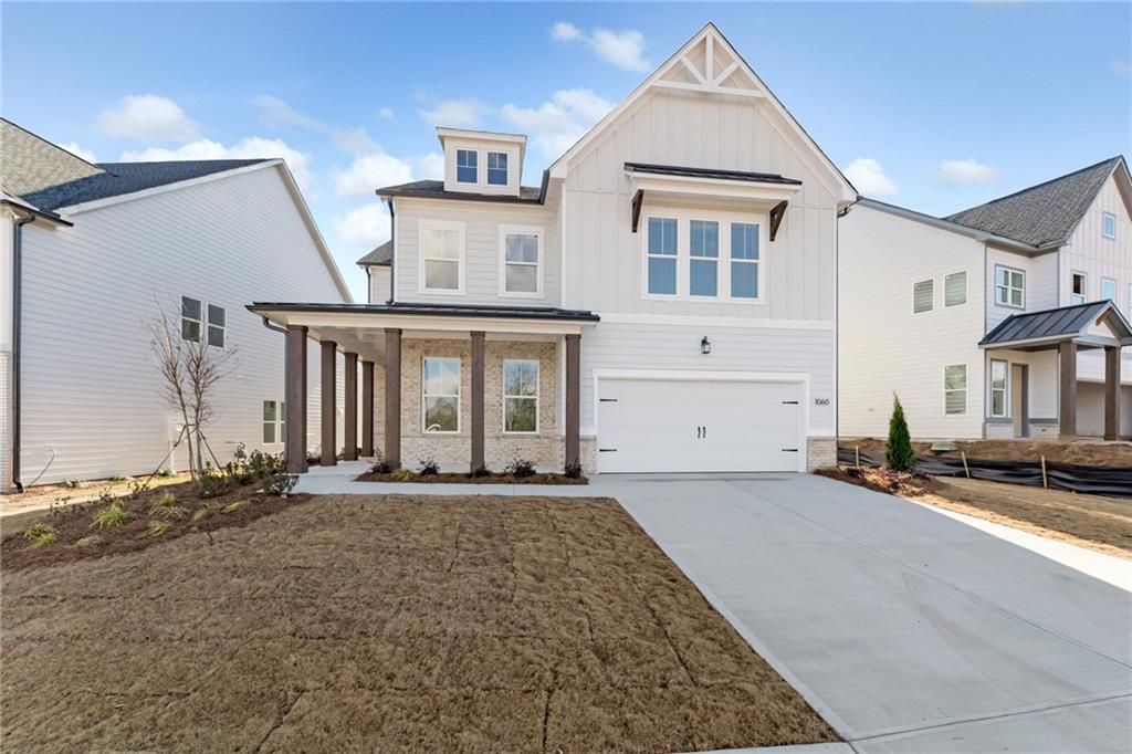 front view of a house with a large window