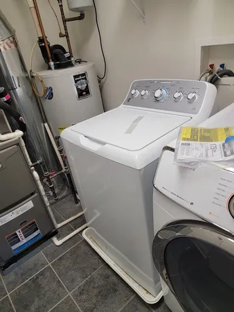 a view of a porch with wooden floor and windows